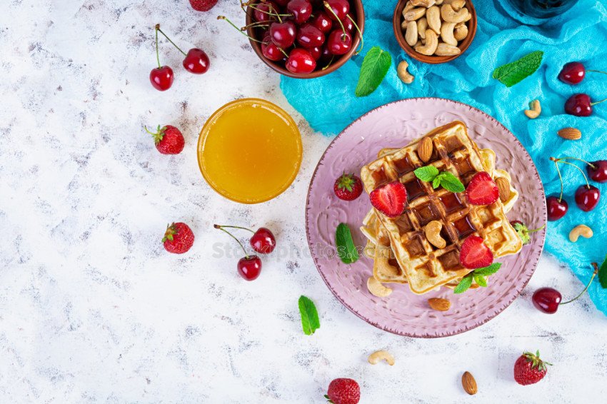 delicious breakfast with belgian waffles waffels with strawberry