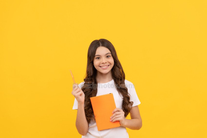 kid planning her study. student prepare for exam. schoolgirl do homework. educational literature.