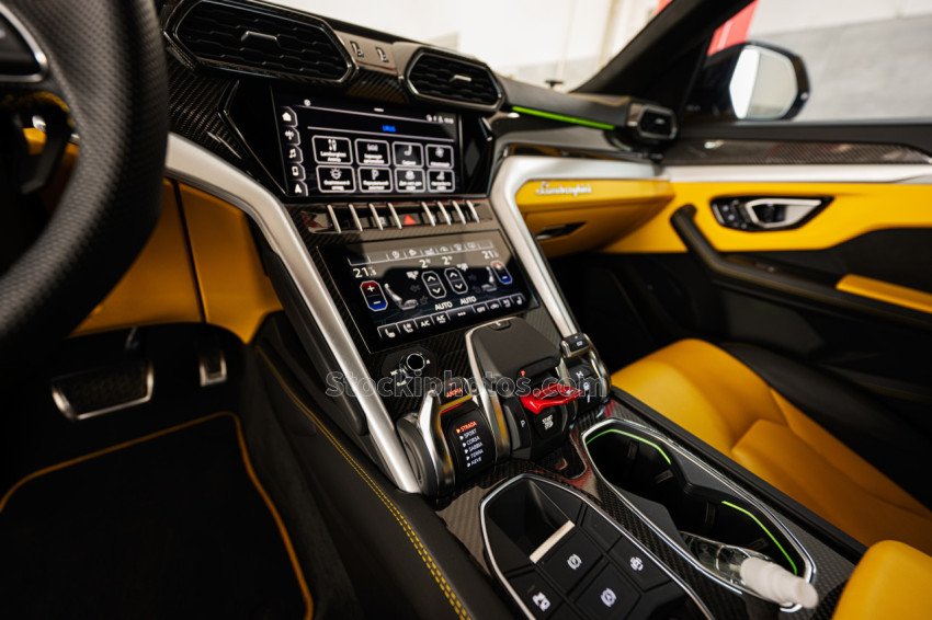 Luxury Car gear box of yellow Lamborghini Urus.