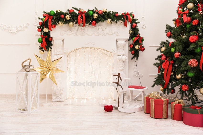 new year cozy home interior with christmas tree and garlands