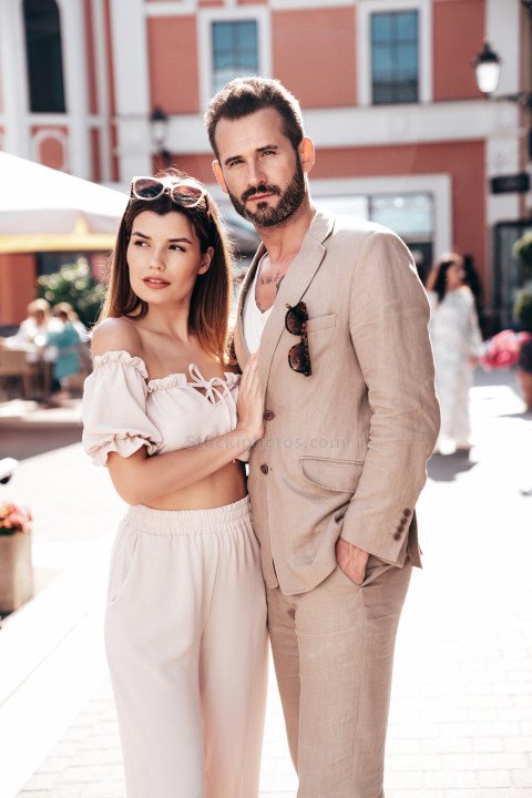 Beautiful fashion woman and her handsome elegant boyfriend in white shirt.